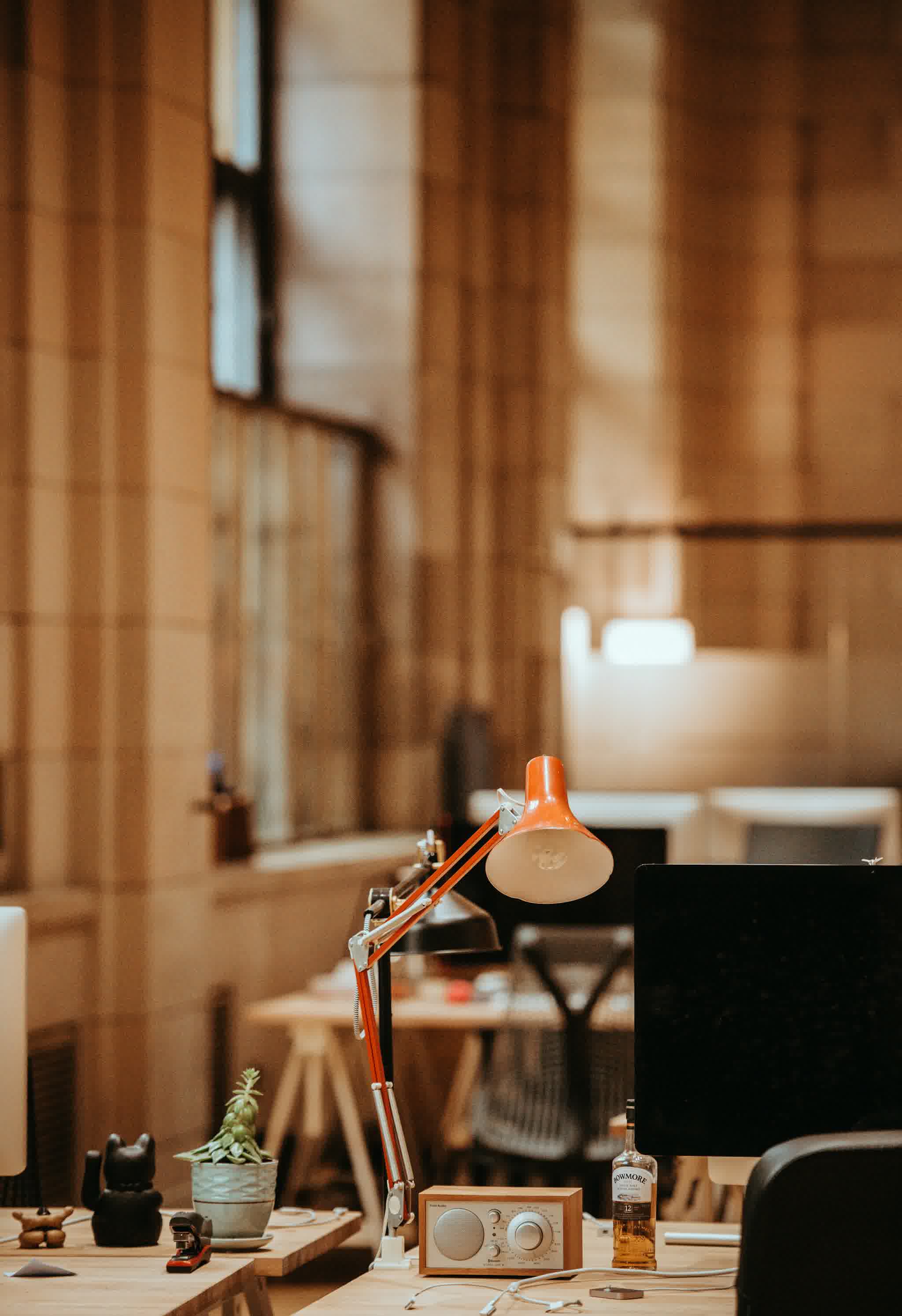 Desk with lamp and paperwork